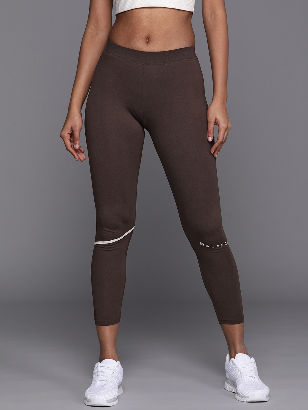 

HRX by Hrithik Roshan Women Slim Fit Cropped Lifestyle Tights, Brown