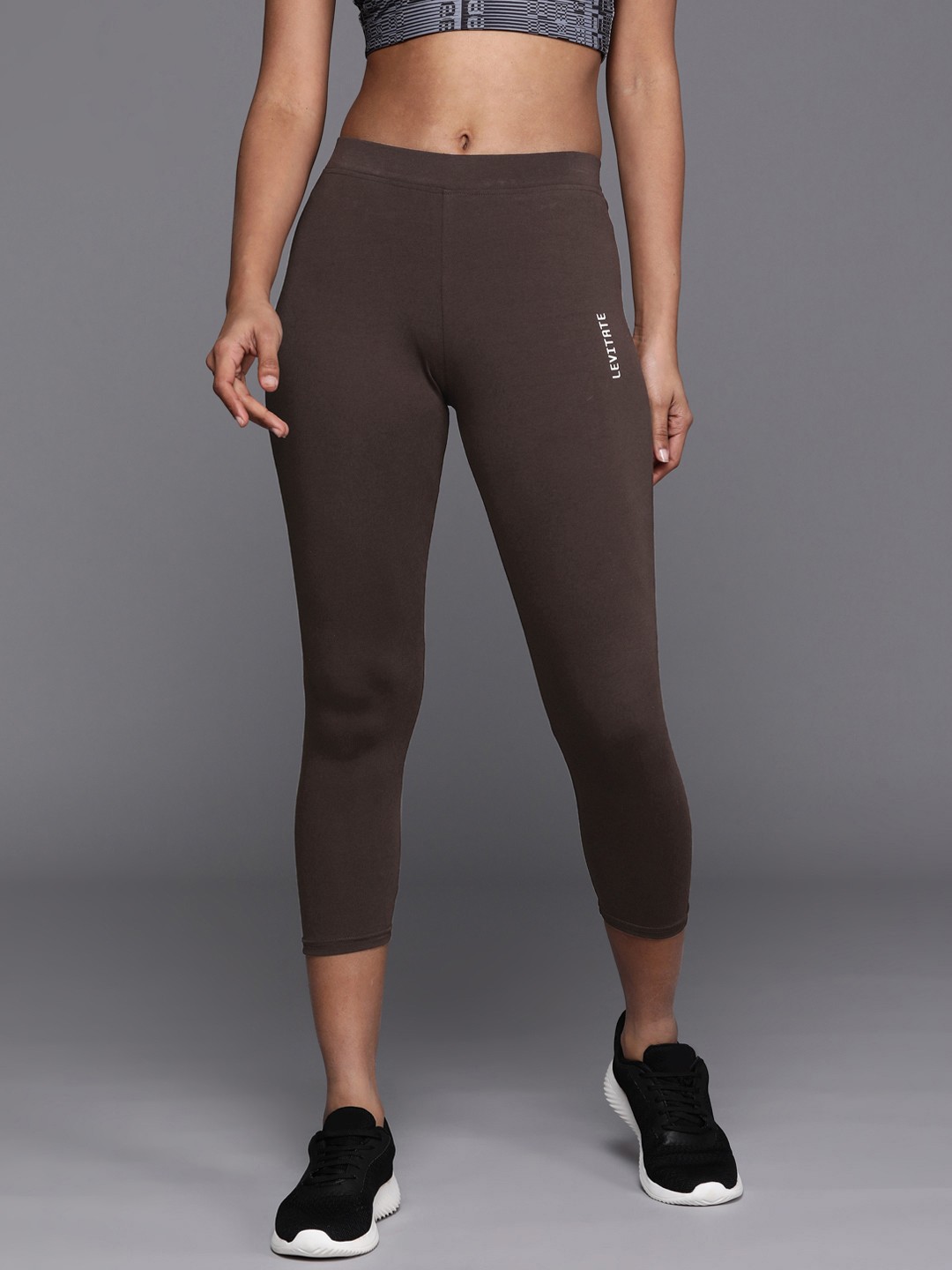 

HRX by Hrithik Roshan Women Slim Fit Cropped Lifestyle Tights, Brown