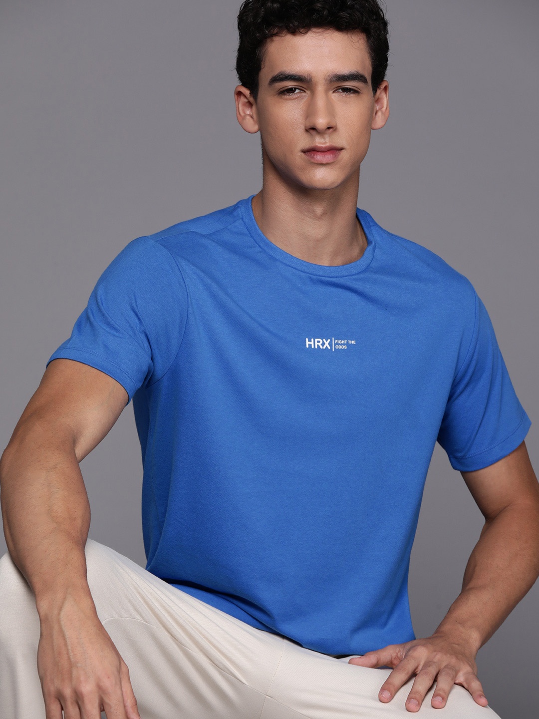 

HRX by Hrithik Roshan Men Solid T-shirt, Blue