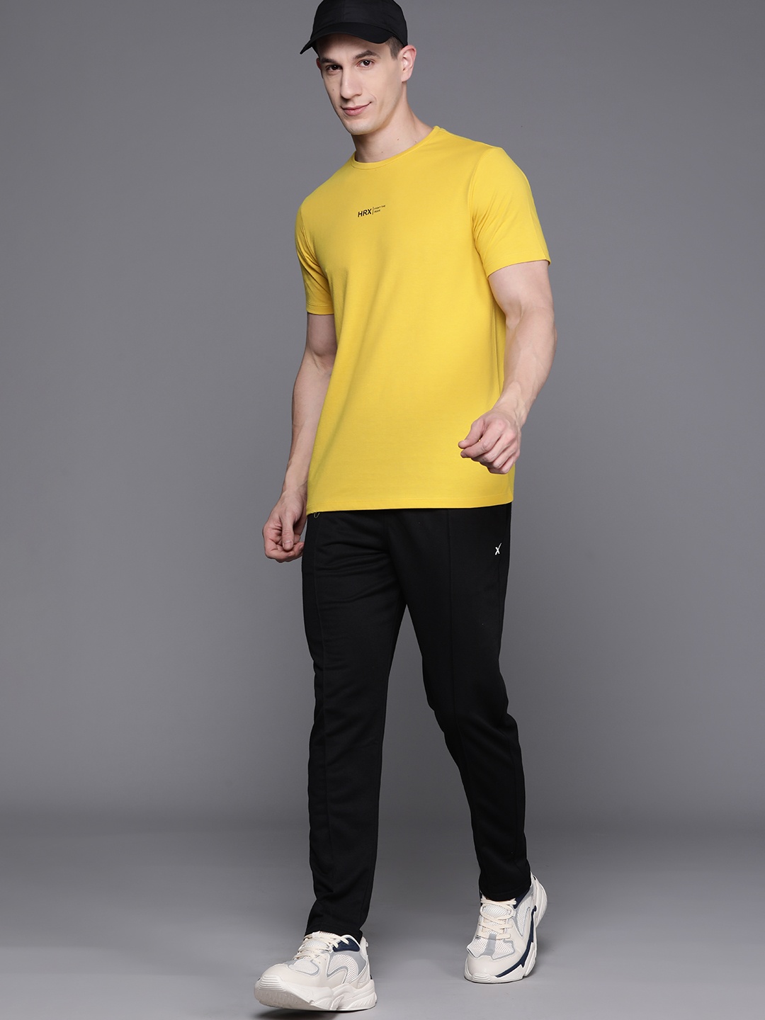 

HRX by Hrithik Roshan Men Solid T-shirt, Yellow