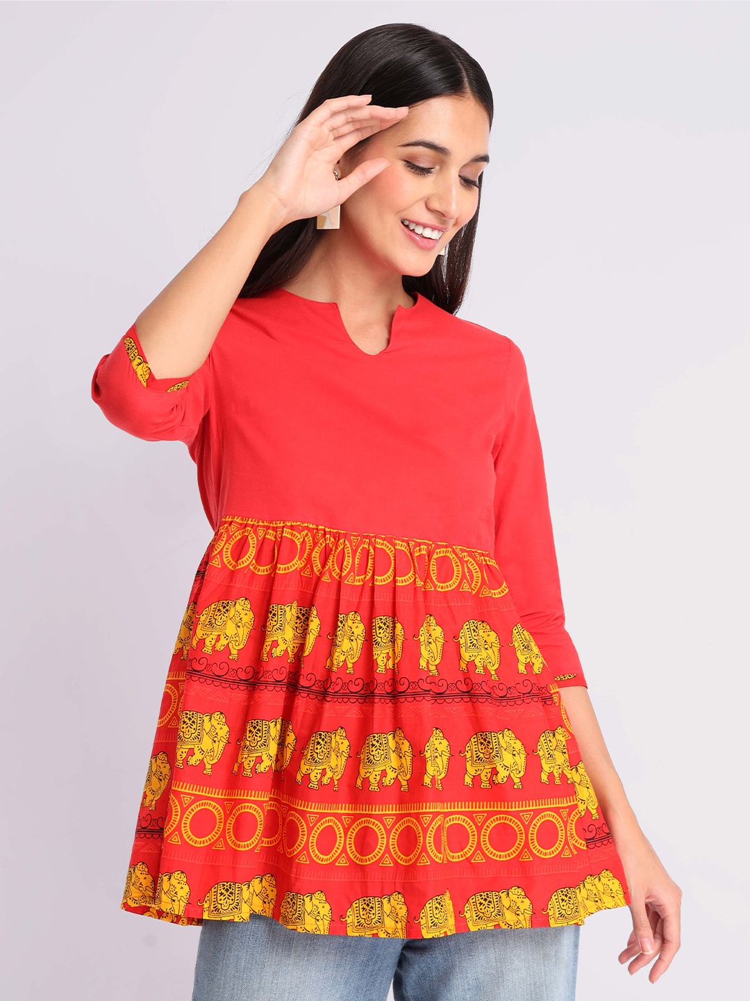 

Beyoung Ethnic Motifs Printed A-Line Pure Cotton Top, Orange