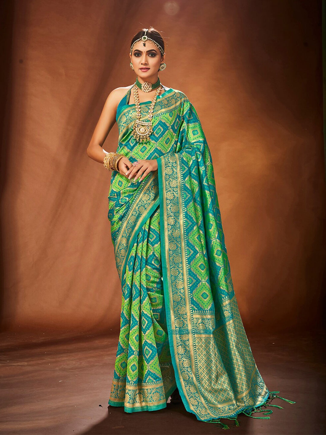 

Mitera Green Woven Design Zari Art Silk Banarasi Saree