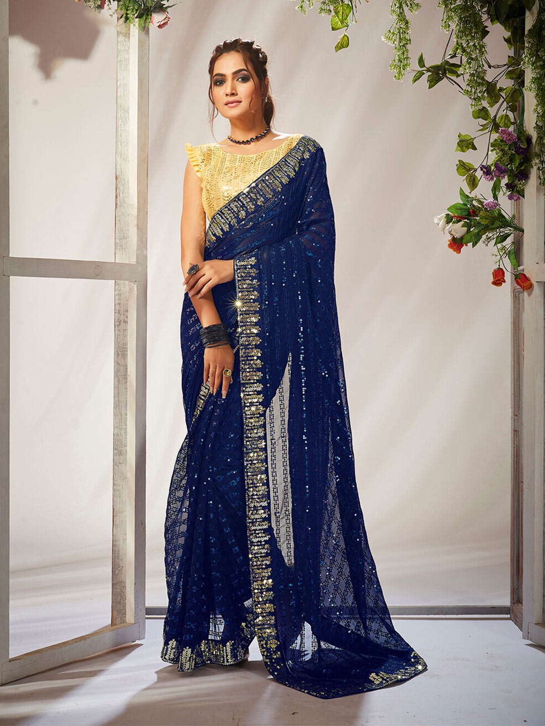 

Mitera Navy Blue Embellished Sequinned Pure Georgette Saree