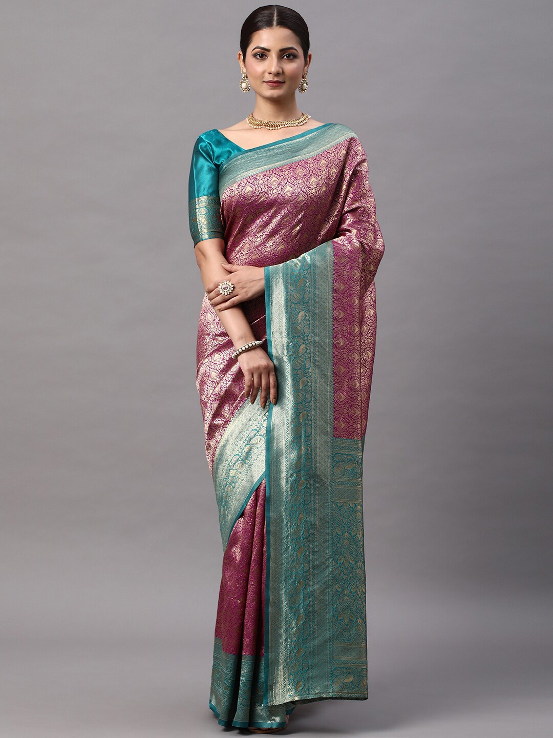 

Mitera Magenta & Sea Green Ethnic Motifs Woven Design Zari Kanjeevaram Saree