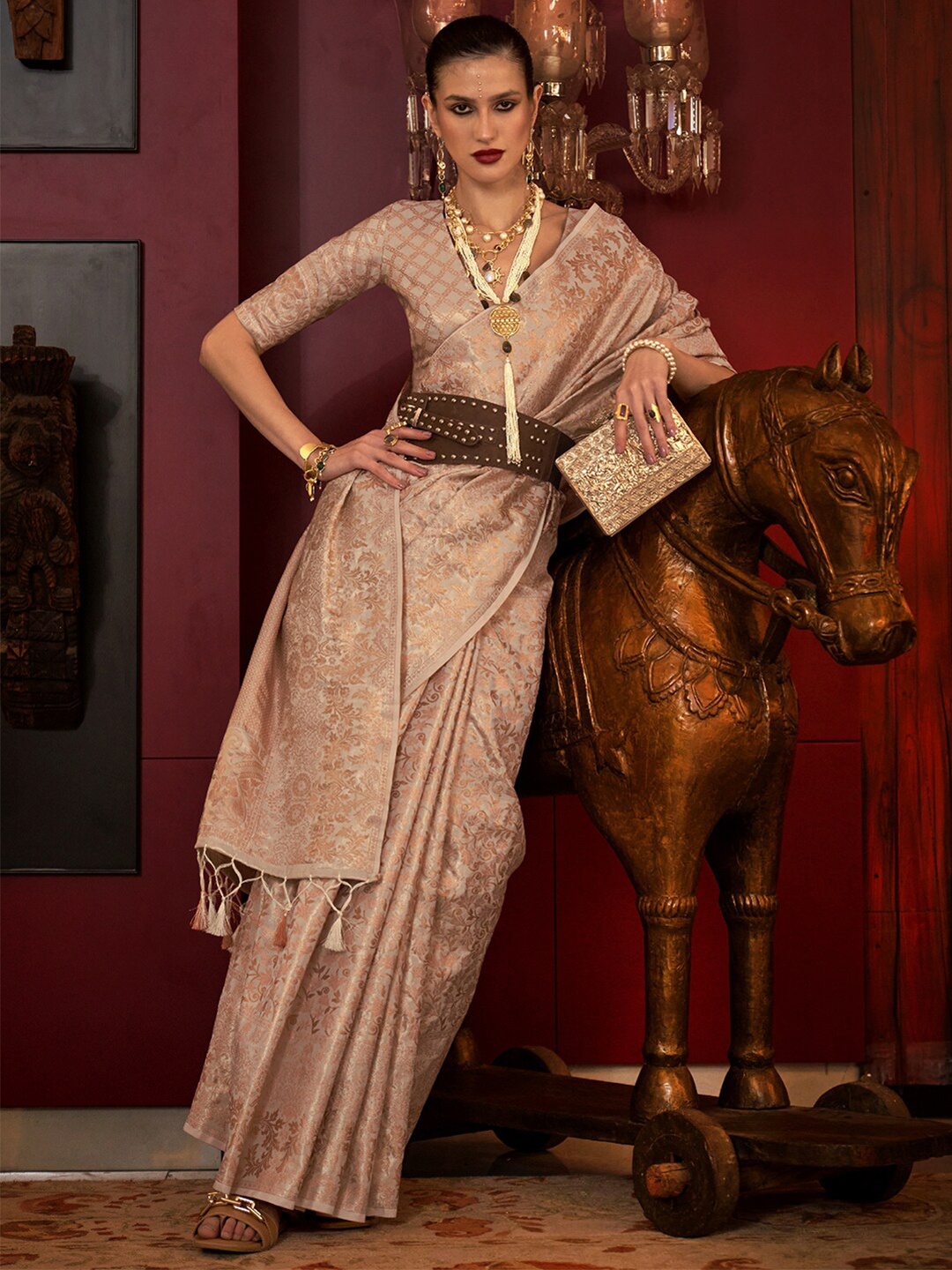 

Mitera Cream-Coloured & Gold-Toned Ethnic Motifs Woven Design Zari Banarasi Saree