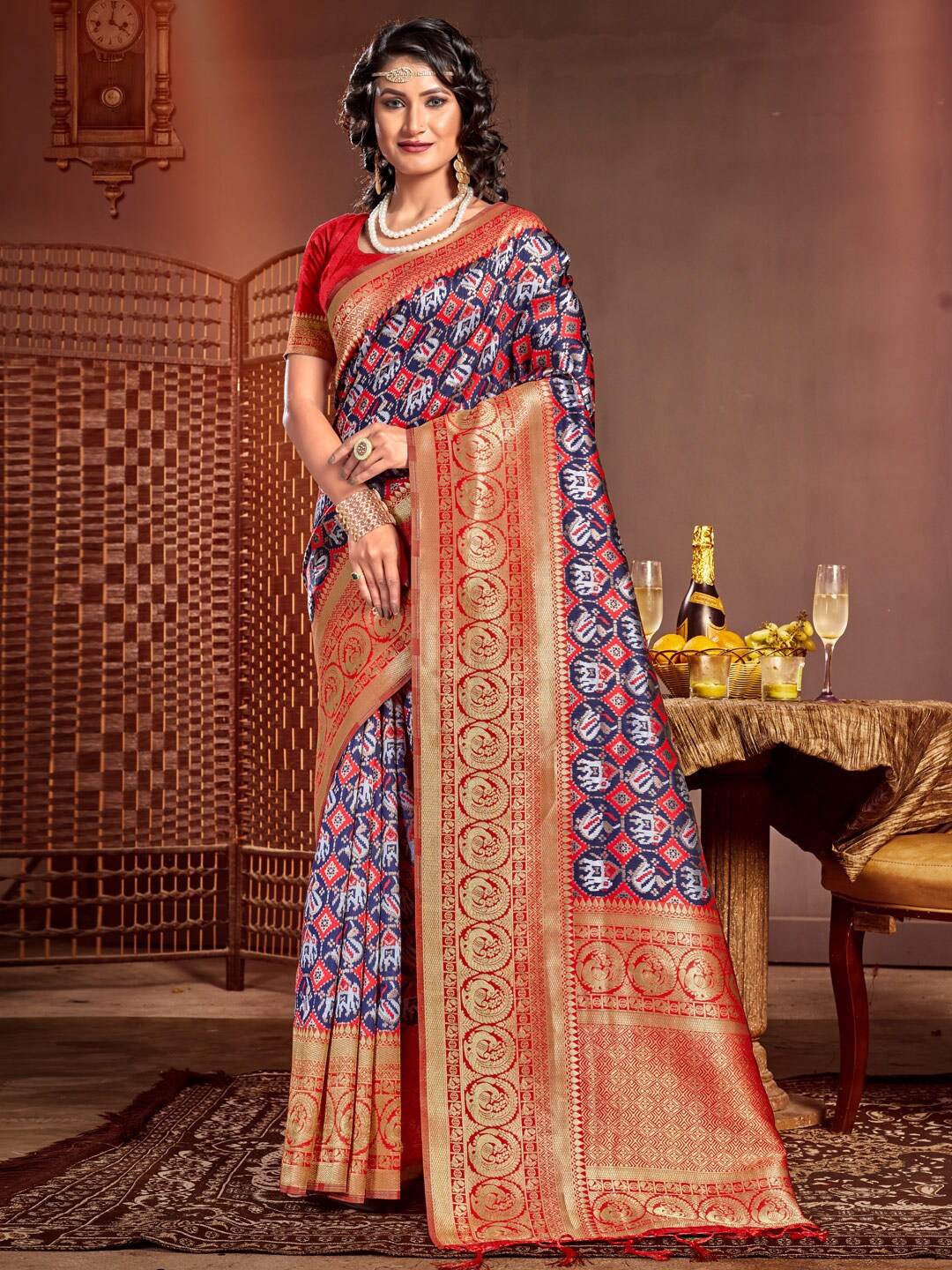 

Mitera Ethnic Motifs Woven Design Zari Pure Silk Patola Saree, Blue