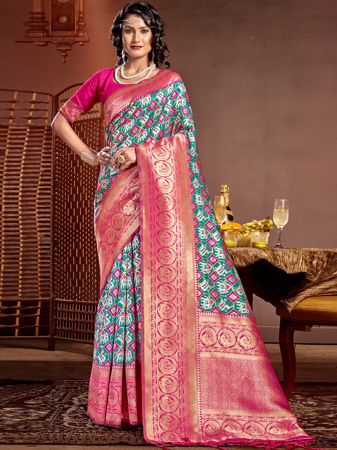 

Mitera Green & Pink Woven Design Zari Pure Silk Patola Saree