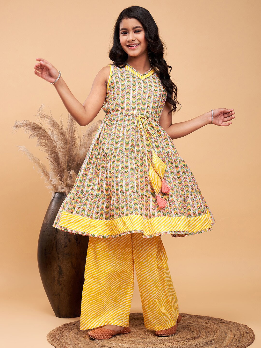 

Stylo Bug Girls Geometric Printed Tiered Gotta Patti Pure Cotton Kurta With Palazzos, Yellow