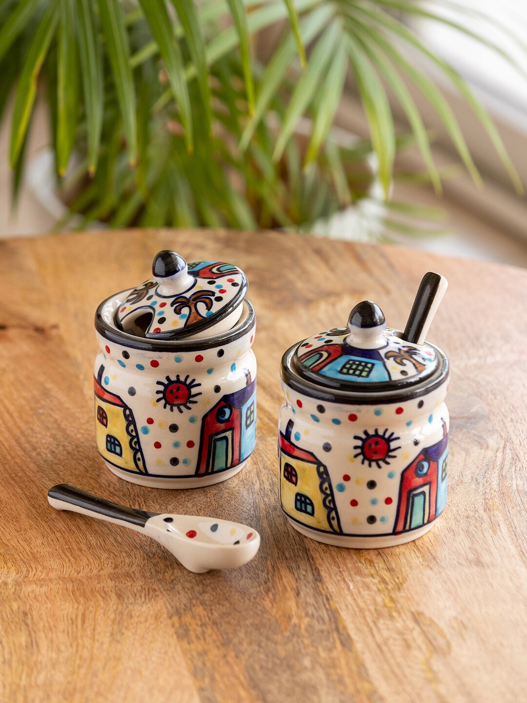 

ExclusiveLane White & Red 2 Pieces Printed Ceramic Jars With Spoons 280ml Each