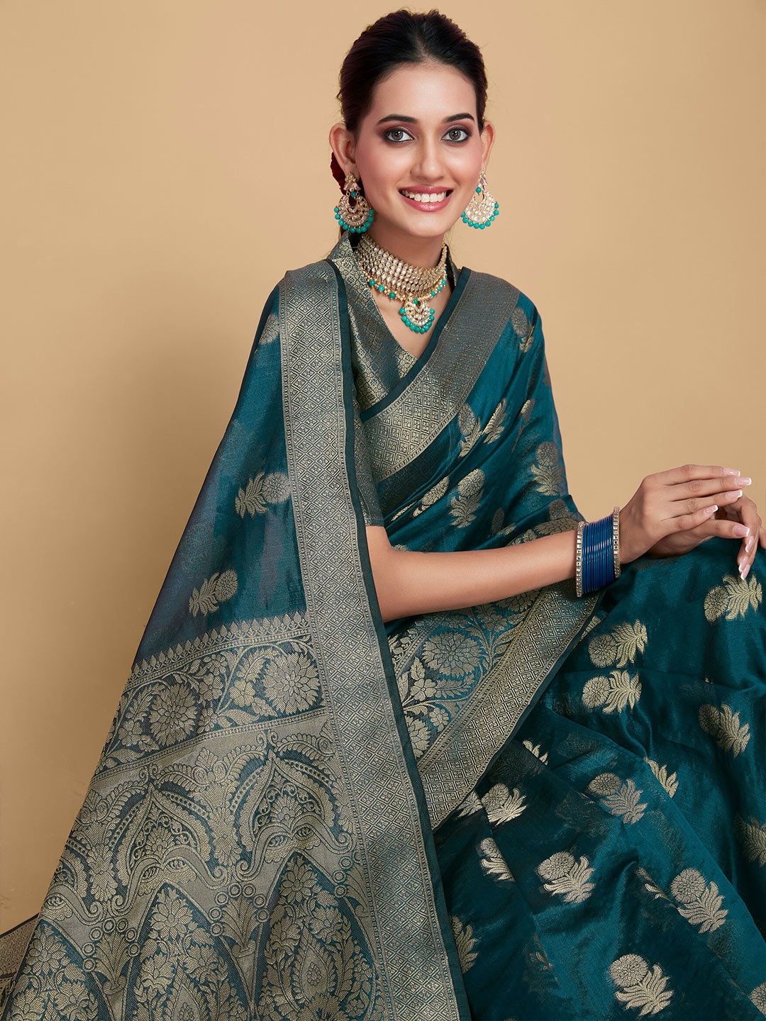 

Sangria Teal Blue Ethnic Motifs Woven Design Zari Organza Saree