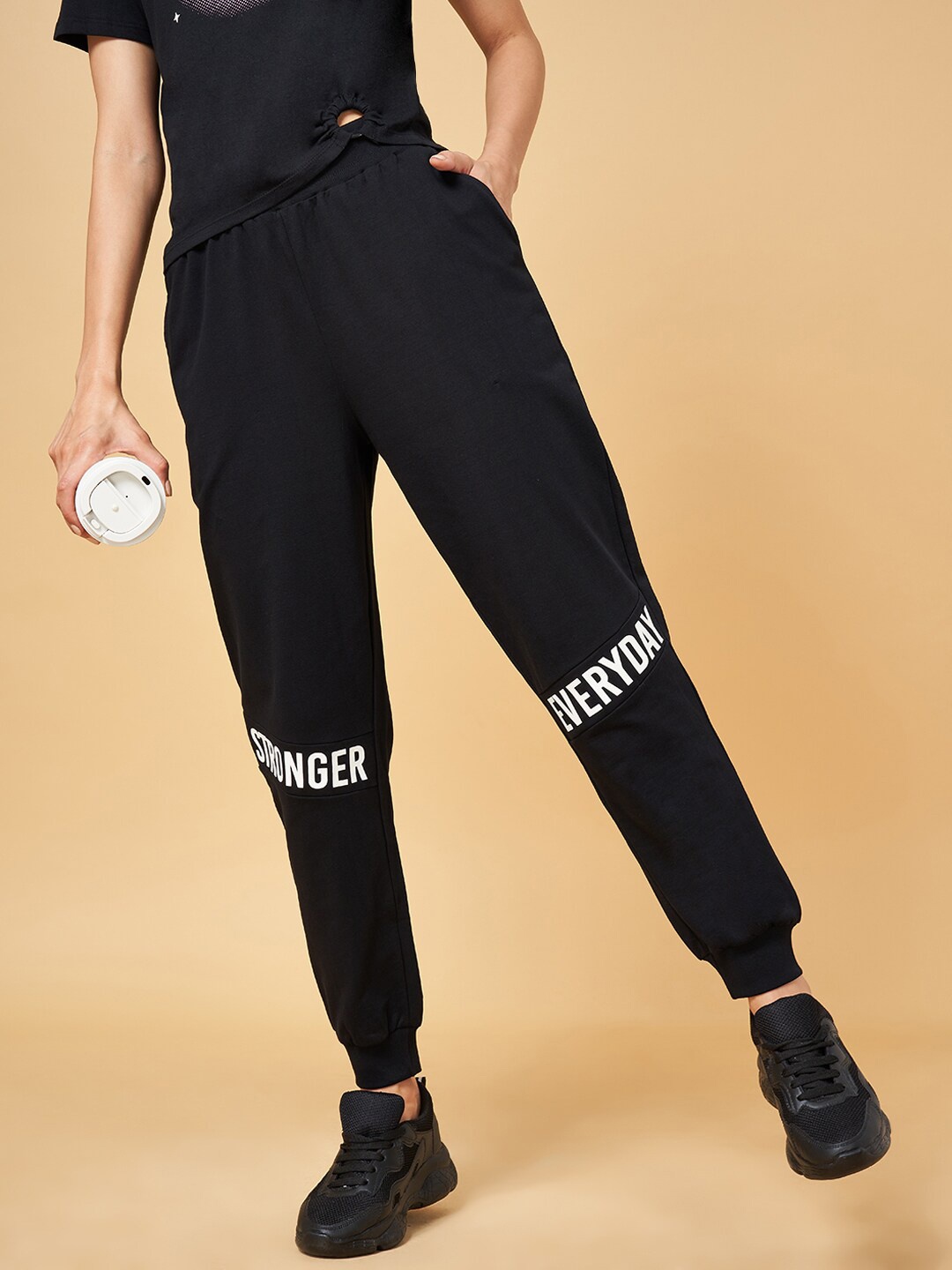 

Ajile by Pantaloons Women Typographic Printed Mid-Rise Cotton Joggers, Black