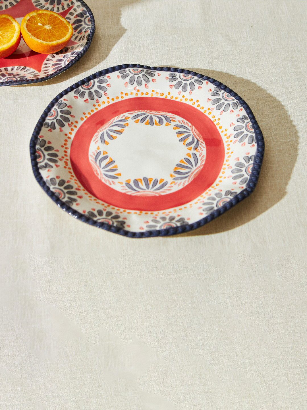 

Chumbak Red Printed Porcelain Matte Plate