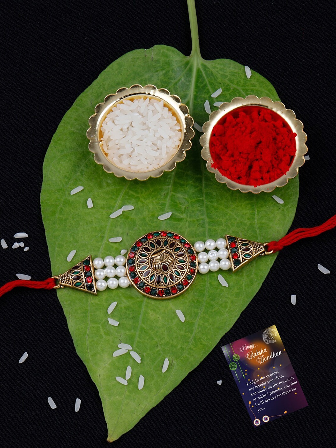 

Silver Shine Set Of 2 Stone Charm Rakhi With Roli Rice & Greeting Card, Red