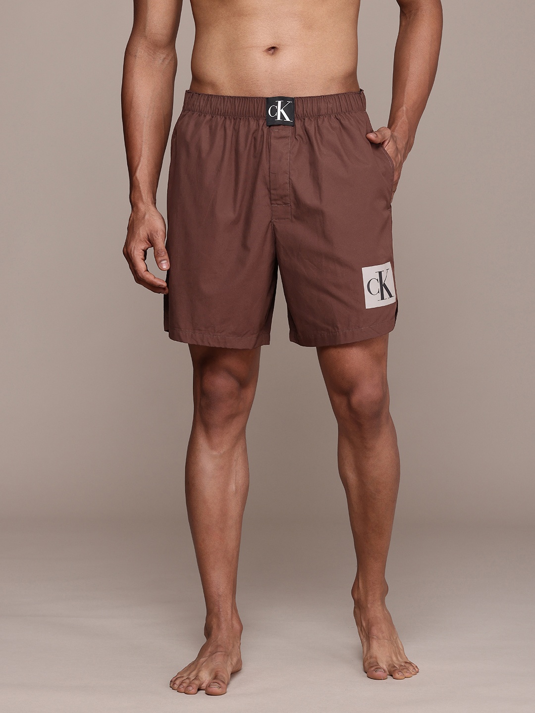 

Calvin Klein Underwear Pure Cotton Boxers with Brand Logo Print on Hem CKUFH003FQ2, Brown