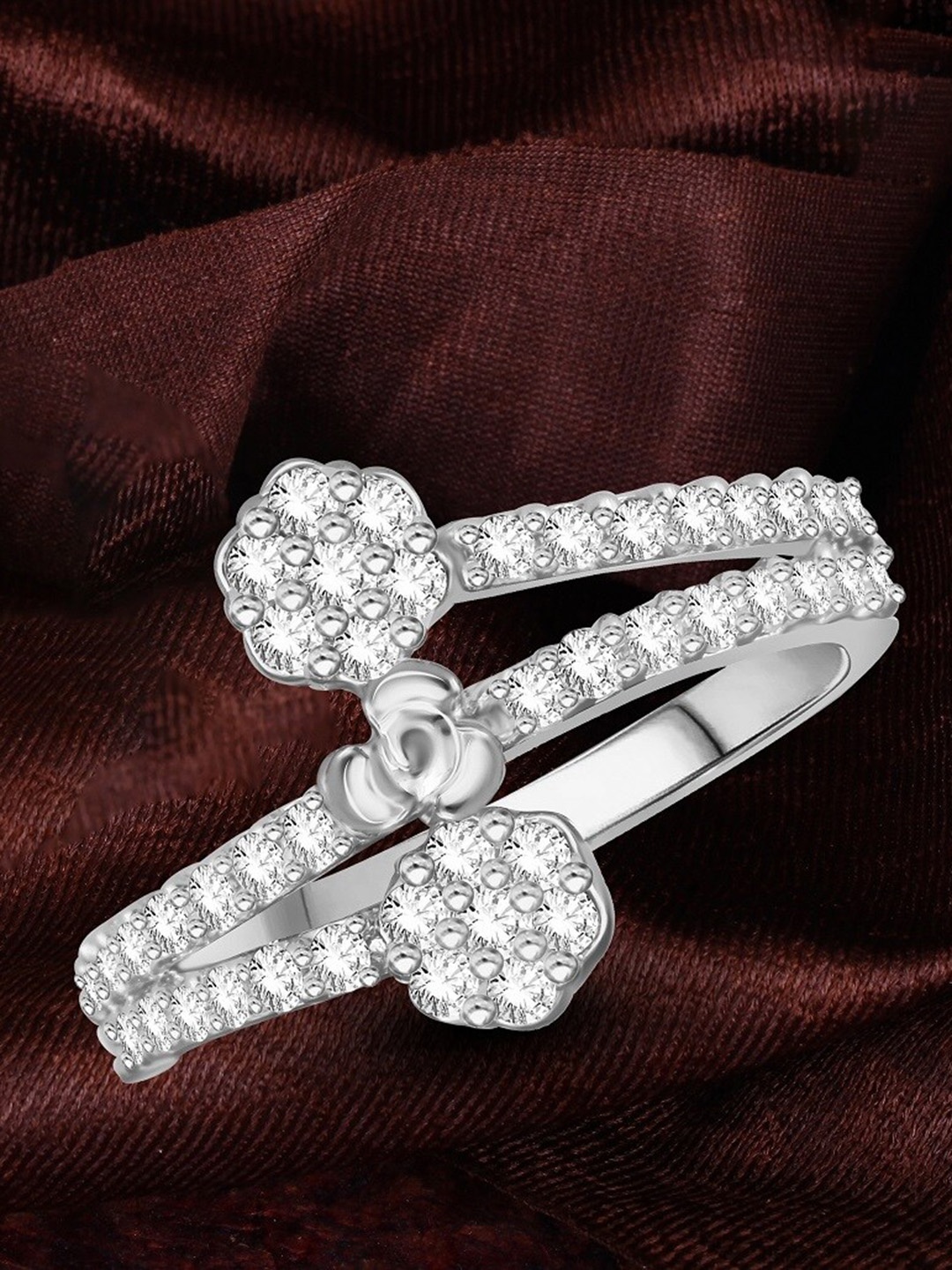 

Vighnaharta Rhodium Plated Floral Shaped Stone Studded Finger Ring, Silver