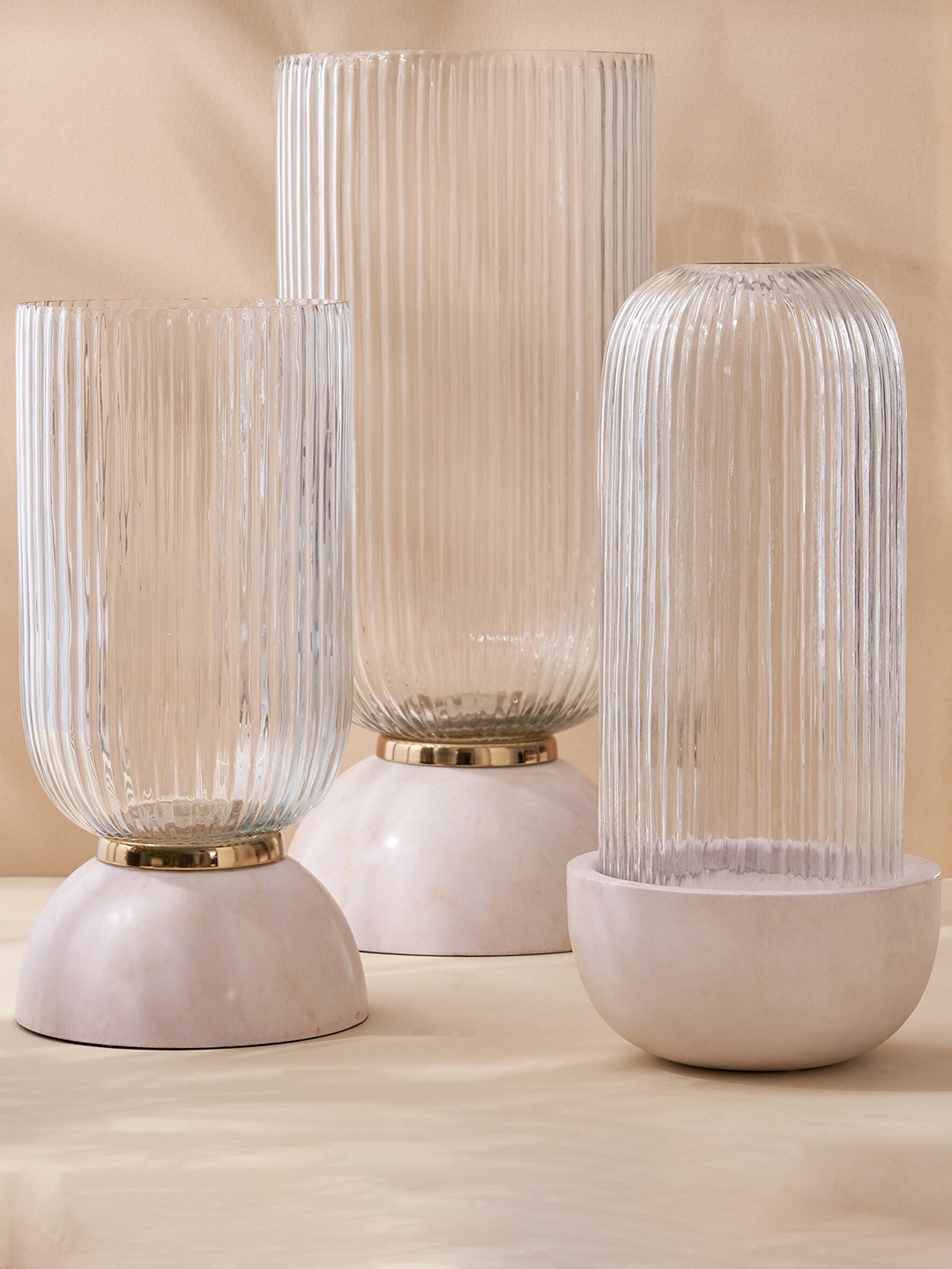 

Home Centre White Textured Glass Candle Holder