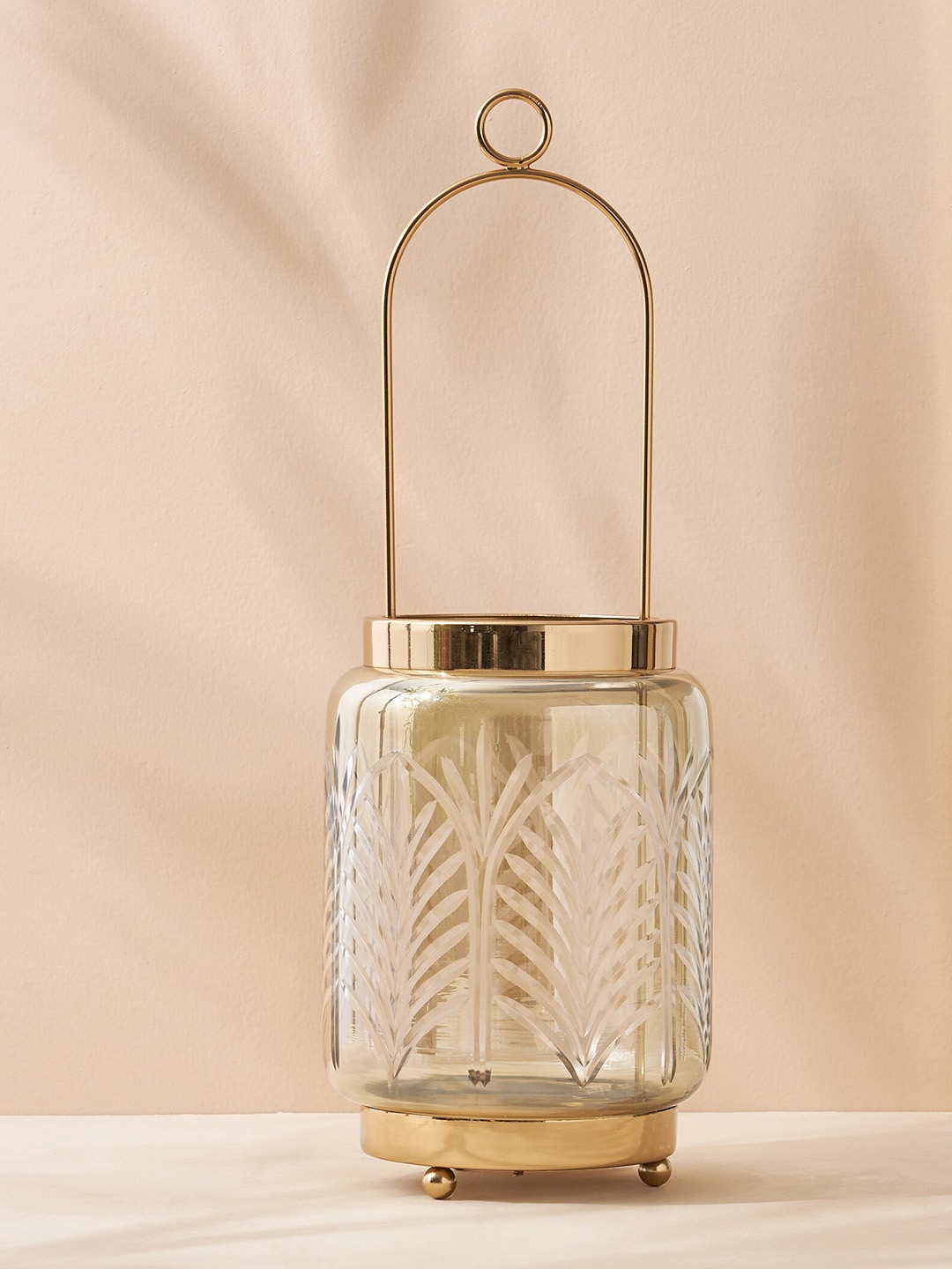 

Home Centre Gold-Toned Textured Cylindrical Hanging Candle Holder