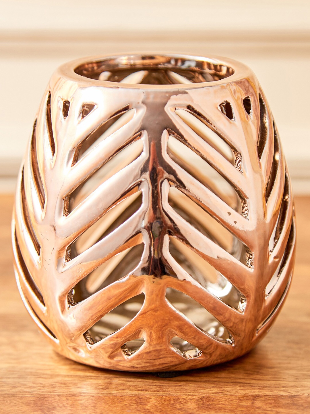 

Home Centre Gold-Toned Cutwork Votive Candle Holder