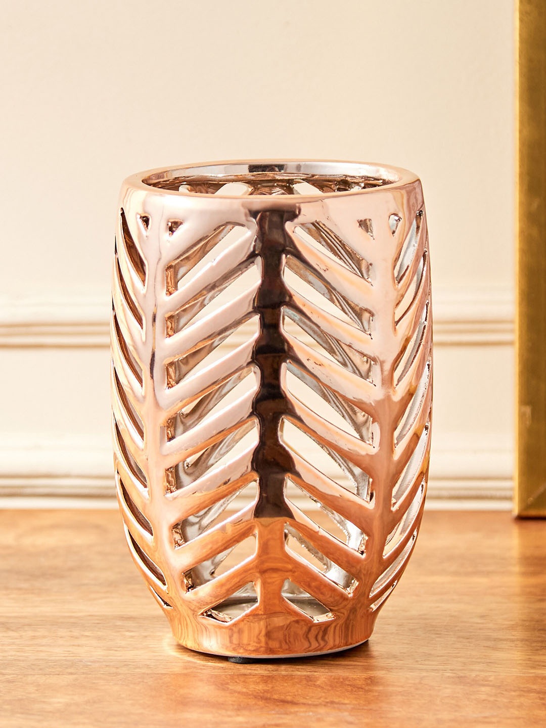 

Home Centre Gold-Toned Chevron Stoneware Cutwork Hurricane Candle Holder