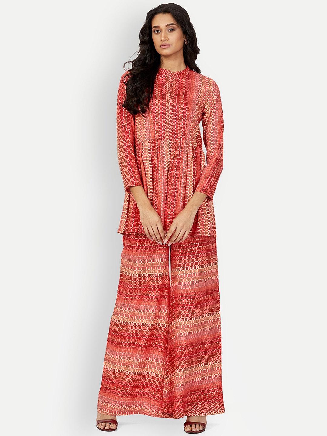 

DRESOUL Printed Top With Flared Palazzos, Red
