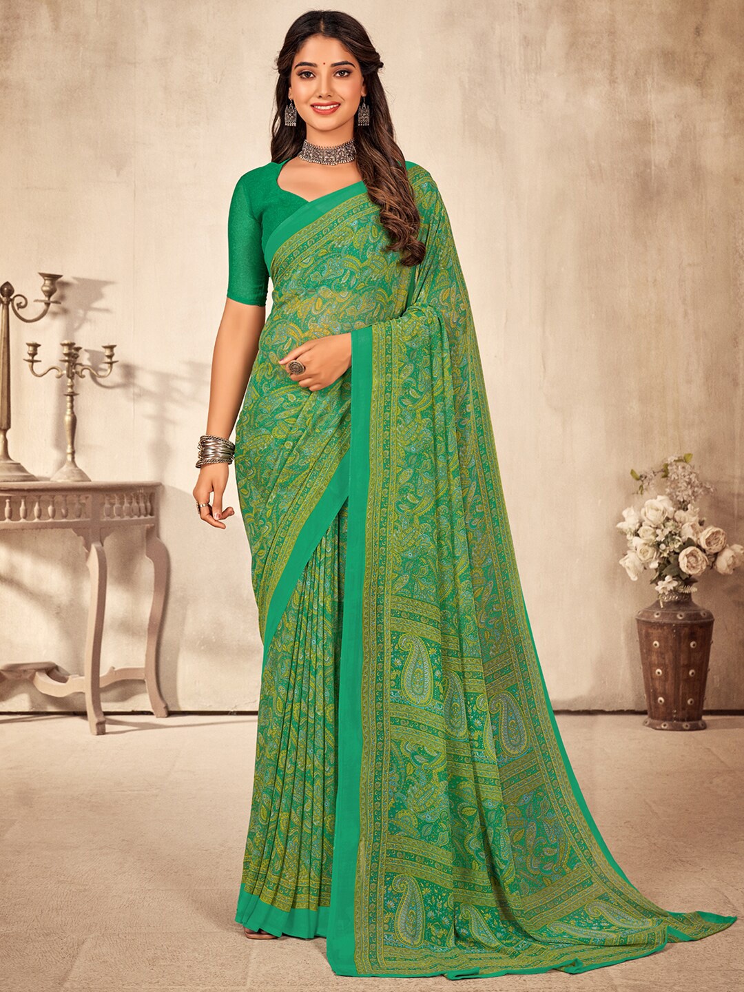 

KALINI Paisley Printed Pure Georgette Dabu Saree, Green