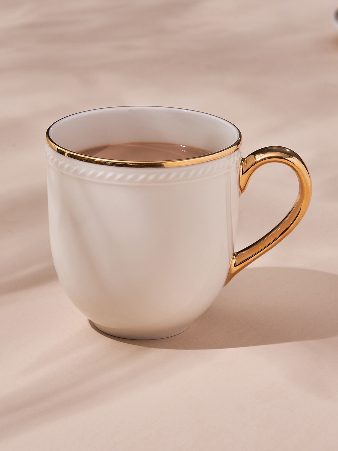 

Home Centre White Solid Stoneware Mug - 180 ML