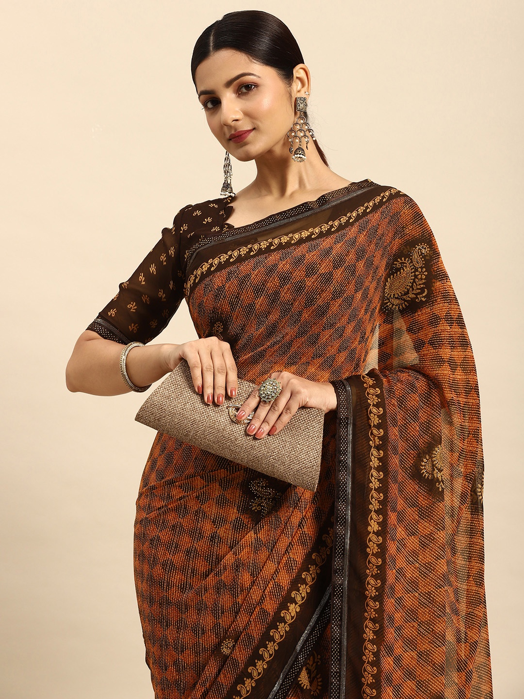 

Mitera Ethnic Motifs Stones-Studded Pure Georgette Saree, Mustard