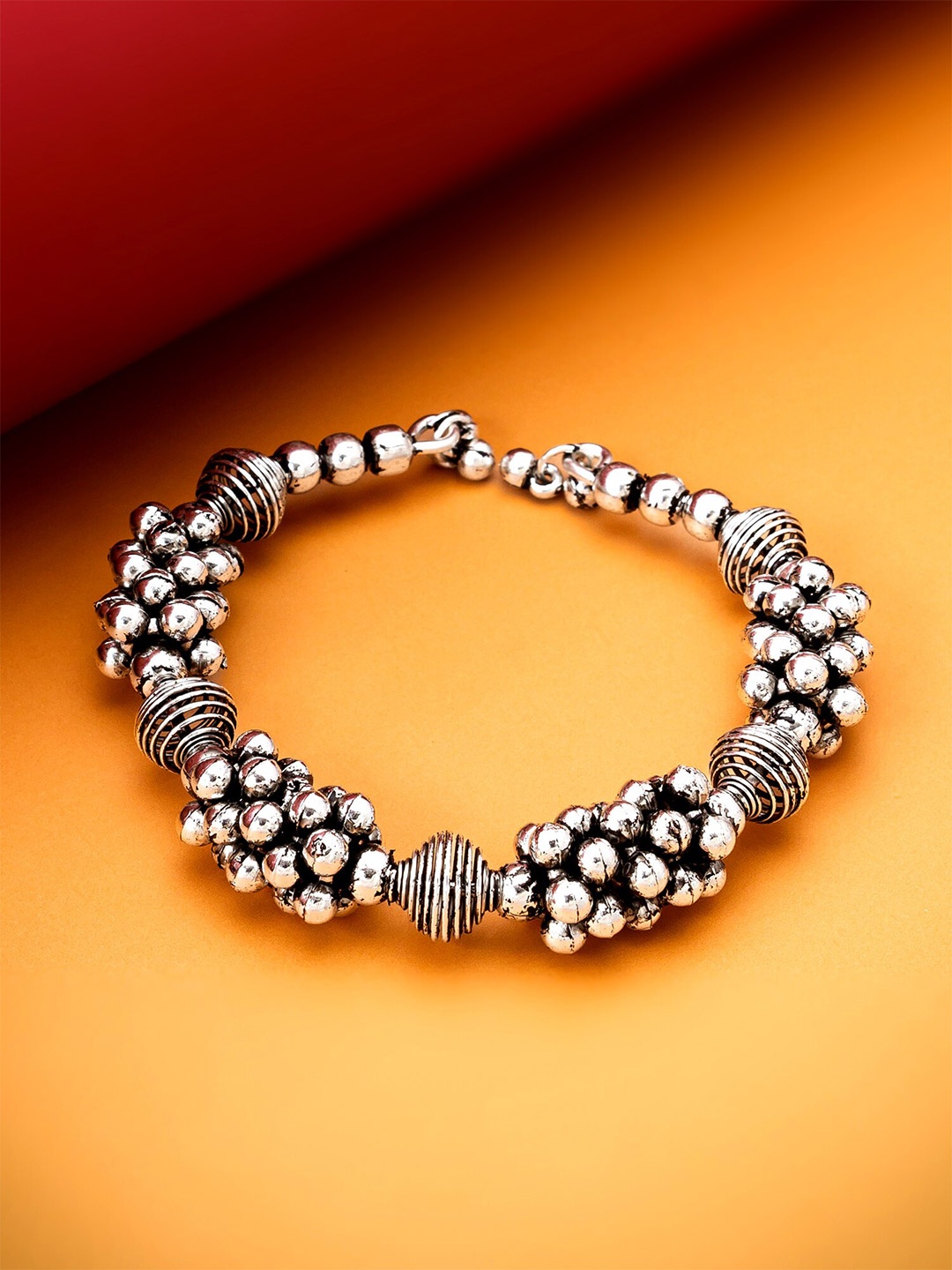 

aadita Silver Plated Oxidised Cuff Bracelet