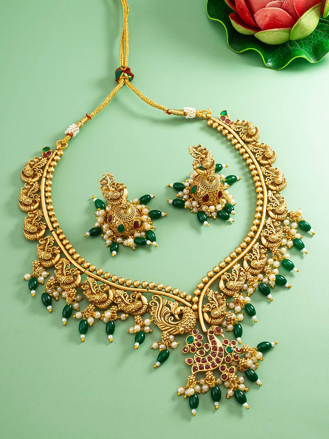 

aadita Gold-Plated Stone-Studded & Beaded Jewellery Set