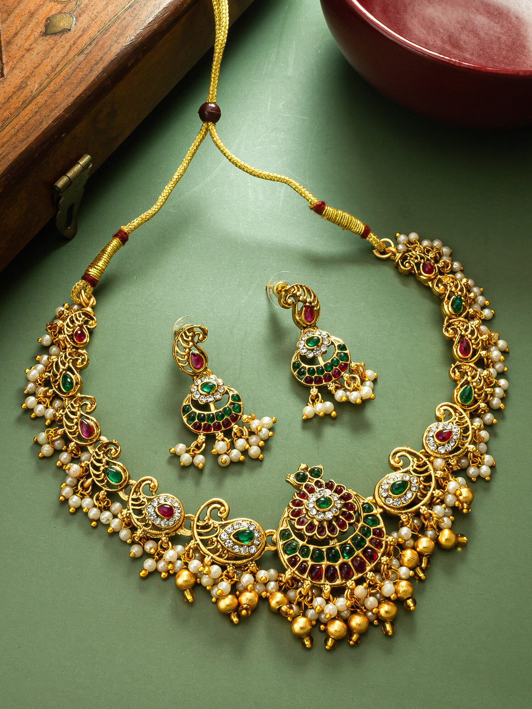 

aadita Gold-Plated Stone-Studded Jewellery Set