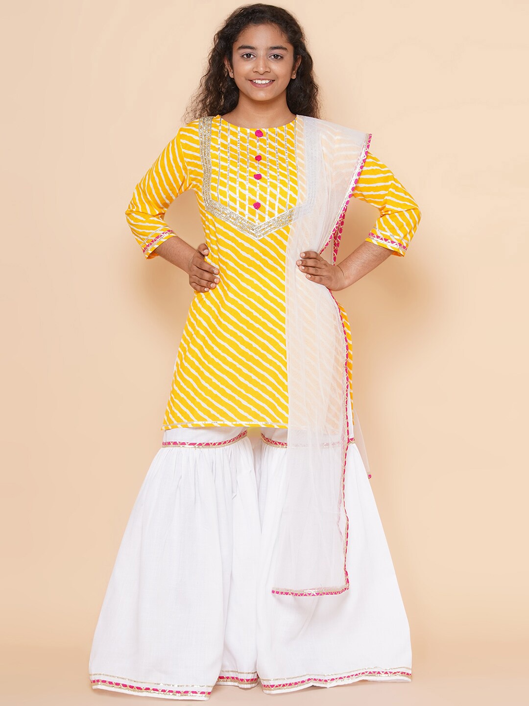 

Modish Couture Girls Leheriya Regular Gotta Patti Kurta With Sharara & Dupatta, Yellow