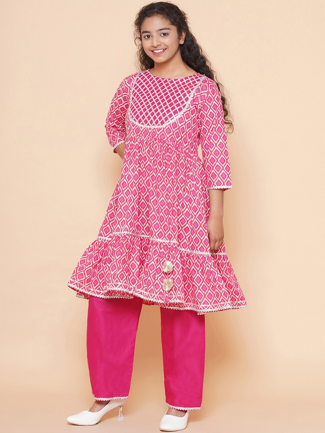 

Modish Couture Girls Geometric Printed Tiered Gotta Patti Kurta With Palazzos, Pink