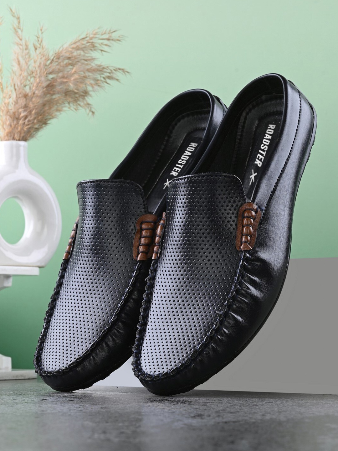 

Roadster Men Black Perforations Comfort Insole Penny Mules
