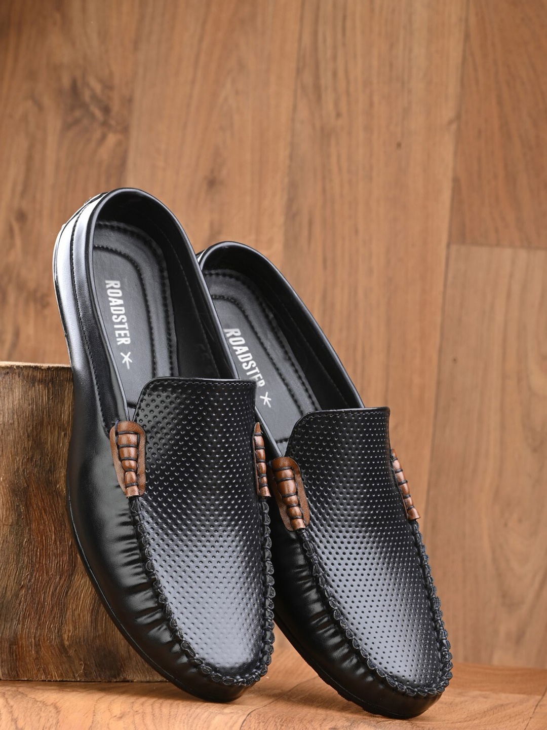 

Roadster Men Black Perforations Comfort Insole Penny Mules