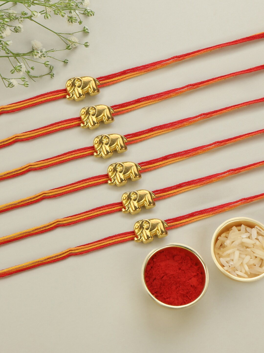 

AccessHer Set Of 6 Gold-Plated Elephant Charm Rakhis With Kumkum Rice & Card