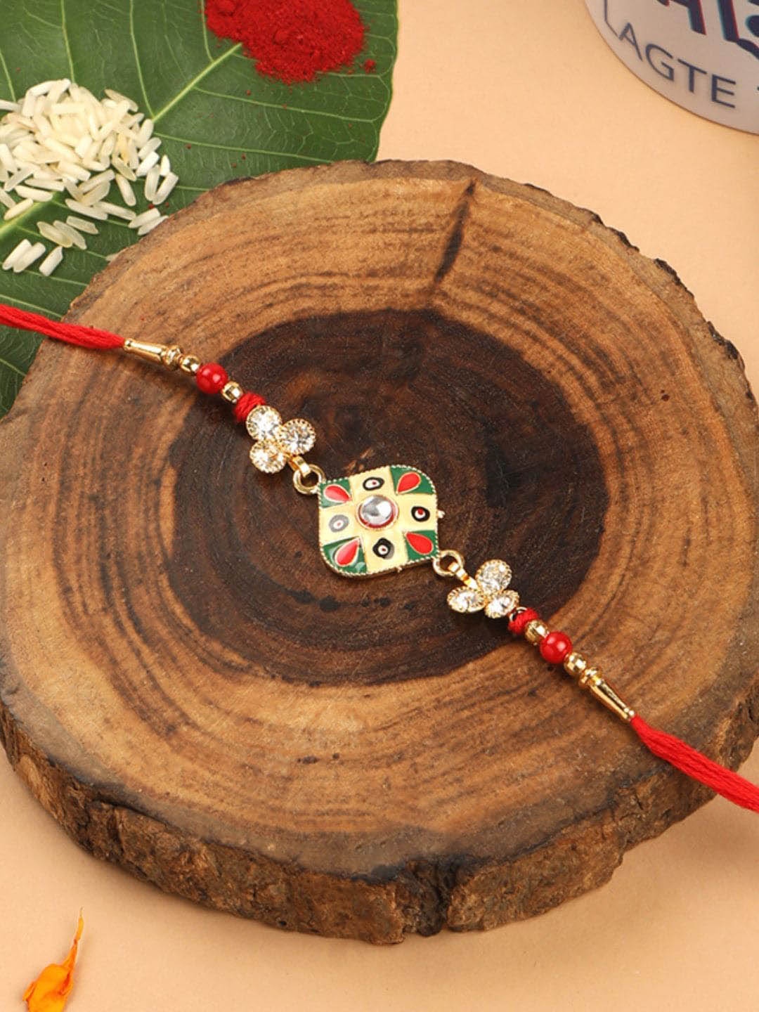 

AccessHer Stone-Studded & Beaded Enamel Thread Rakhi With Roli & Rice, Gold