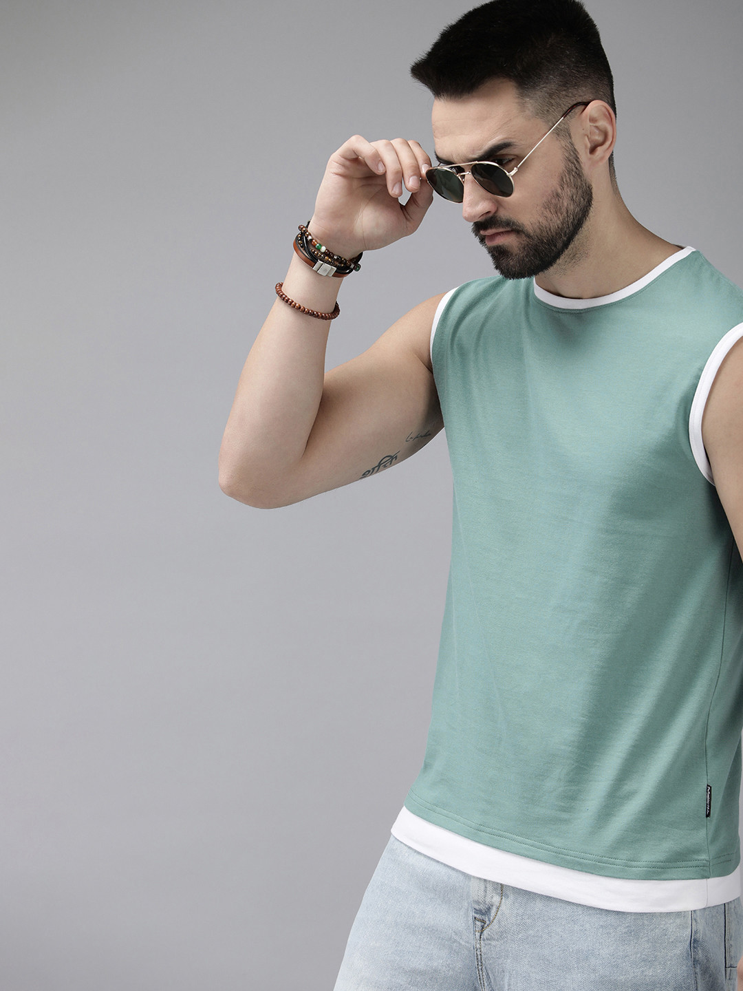 

Roadster Men Solid Pure Cotton T-shirt, Sea green