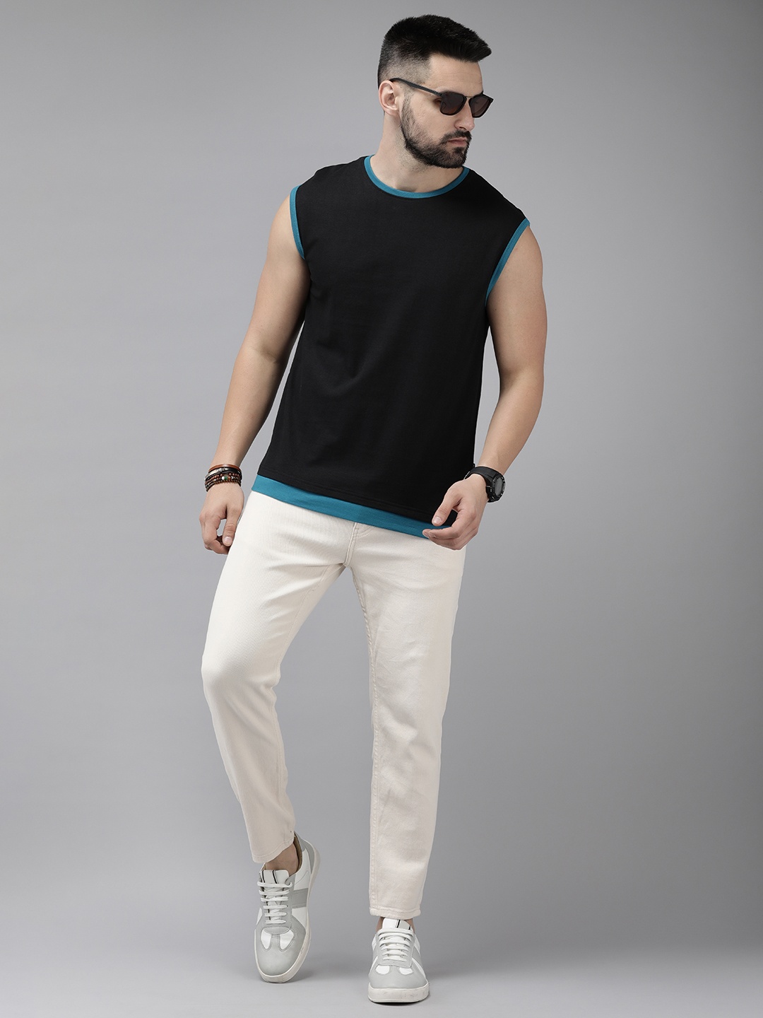 

Roadster Men Solid Pure Cotton T-shirt, Black