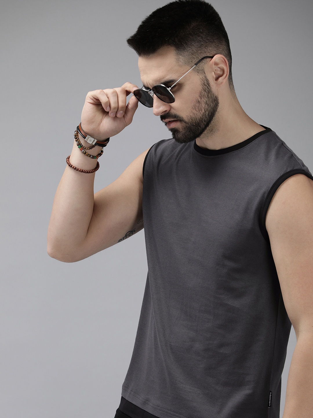 

Roadster Men Solid Pure Cotton T-shirt, Grey