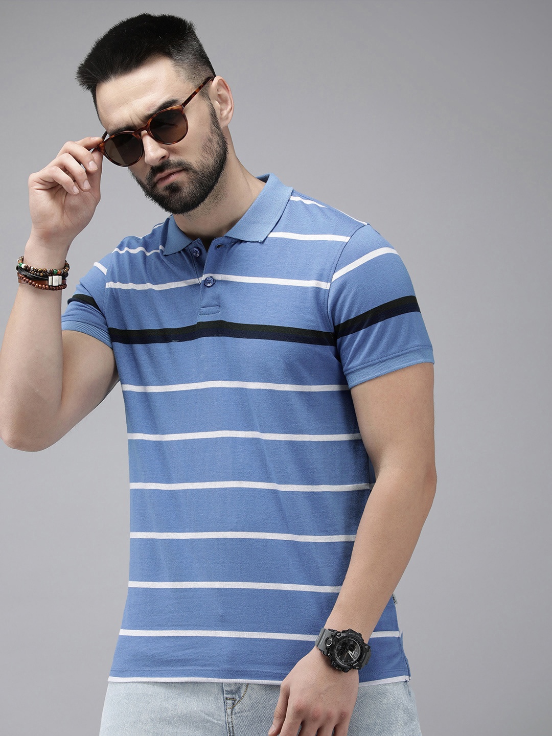 

Roadster Men Striped Polo Collar T-shirt, Blue