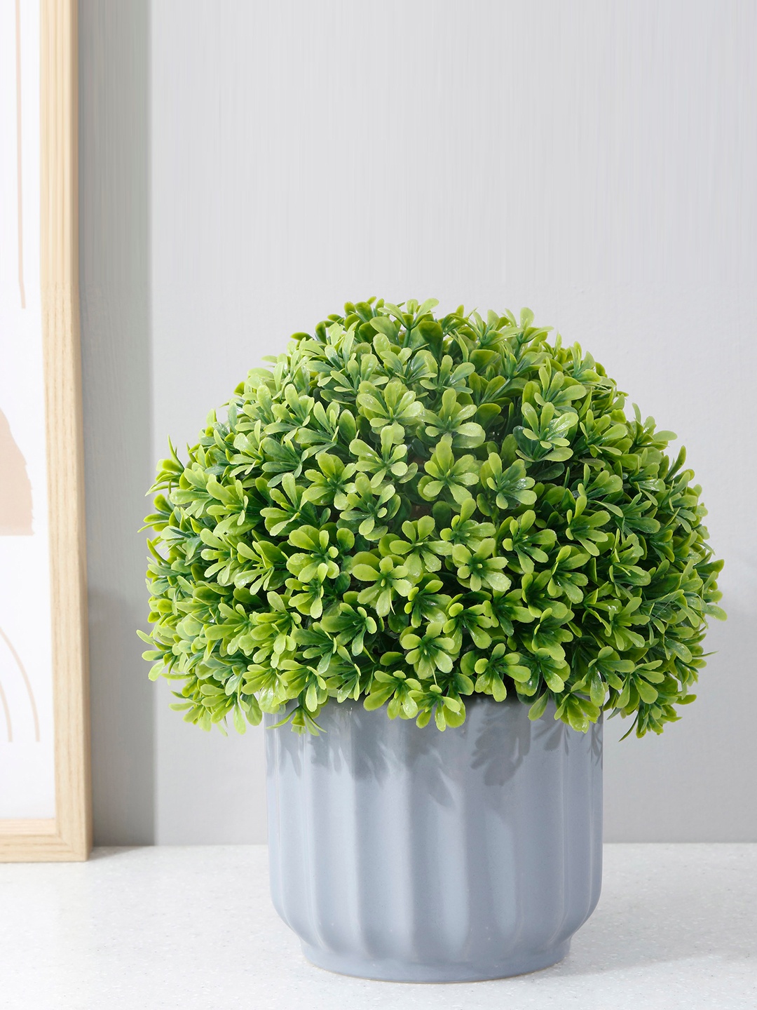 

Home Centre Lets Garden Grey Textured Ceramic Planter