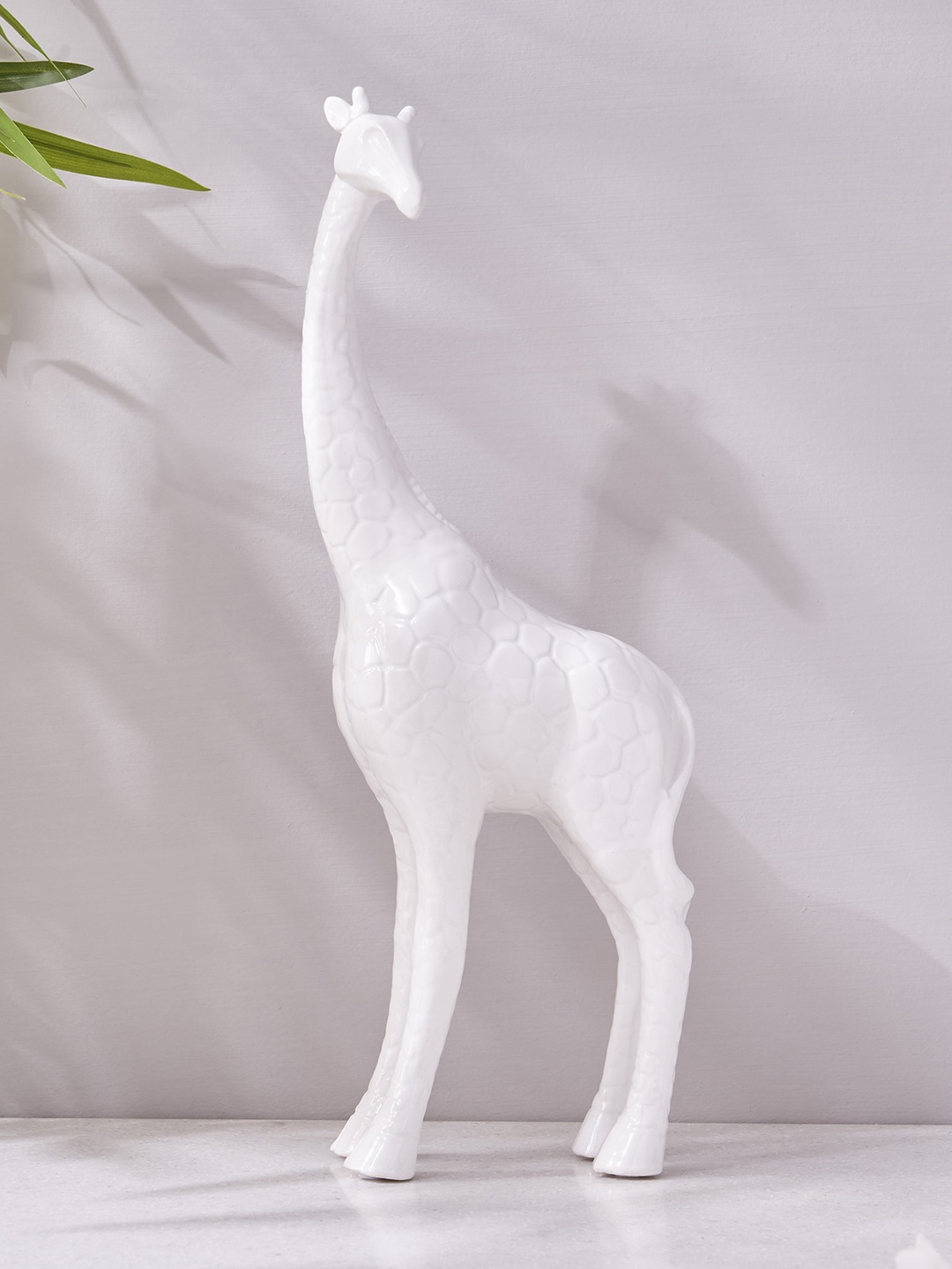 

Home Centre Brighton White Giraffe Showpiece