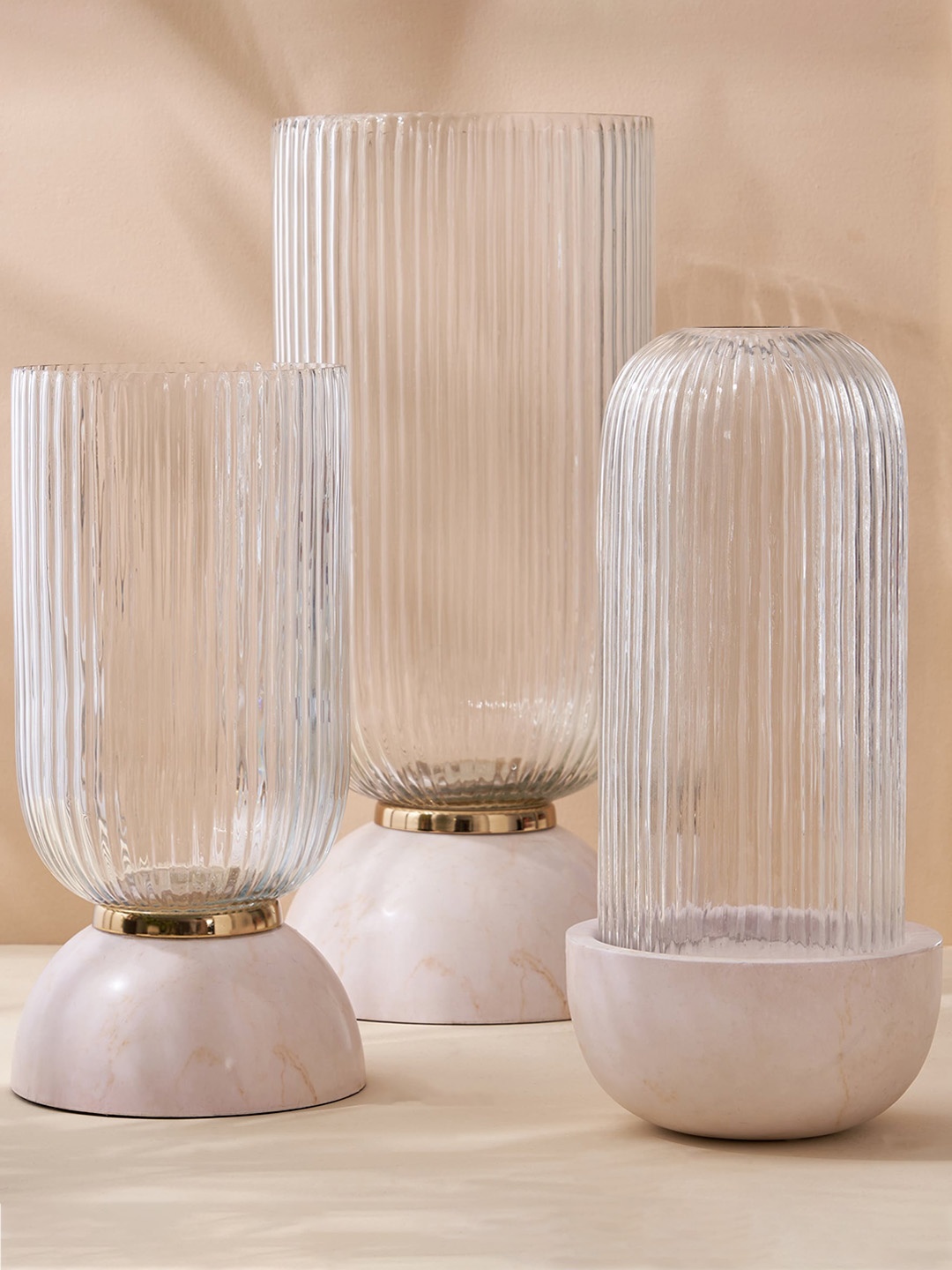 

Home Centre Splendid-Dastkari White Glass Textured Marble Base Vases