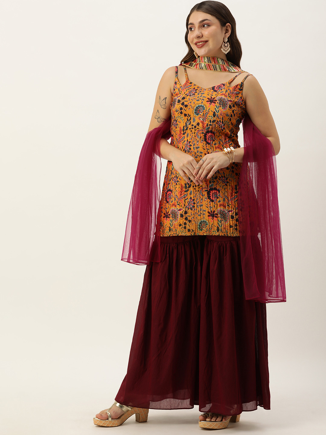 

Ethnovog Women Floral Printed Regular Kurti with Sharara & With Dupatta, Yellow