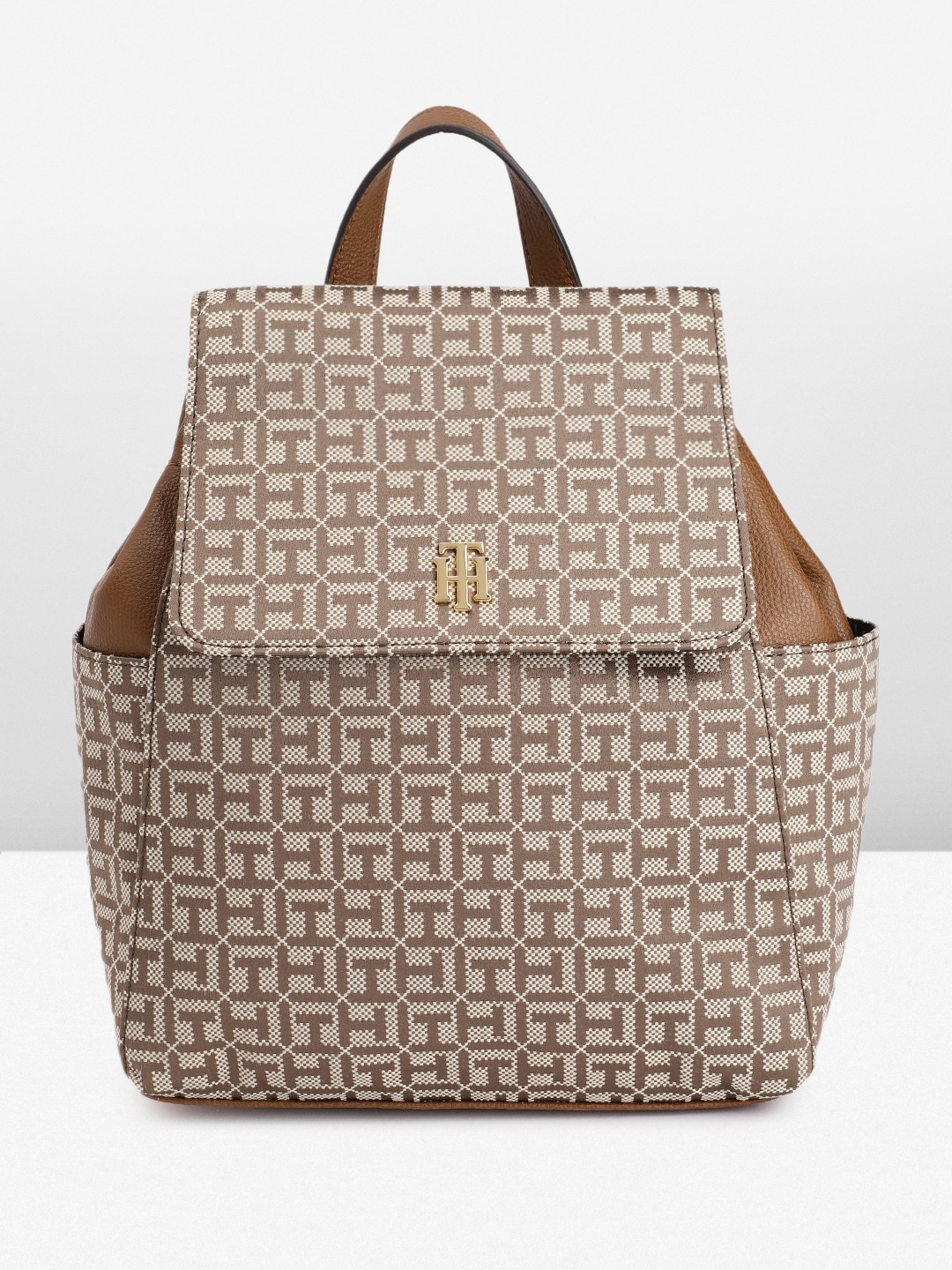

Tommy Hilfiger Women Brand Logo Self Design Small Backpack, Brown