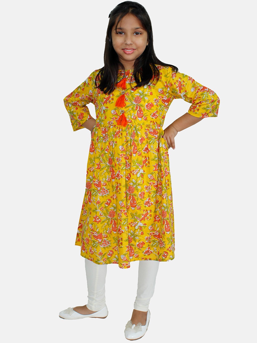 

KiddoPanti Girls Round Neck Floral Printed Regular Pure Cotton Kurta & Legging, Mustard