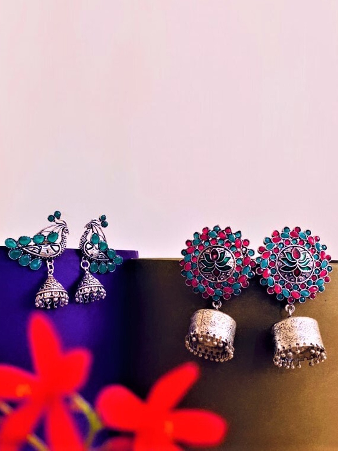 

ATIBELLE Set of 2 Silver Plated Stone Studded Peacock & Floral Shaped Jhumkas