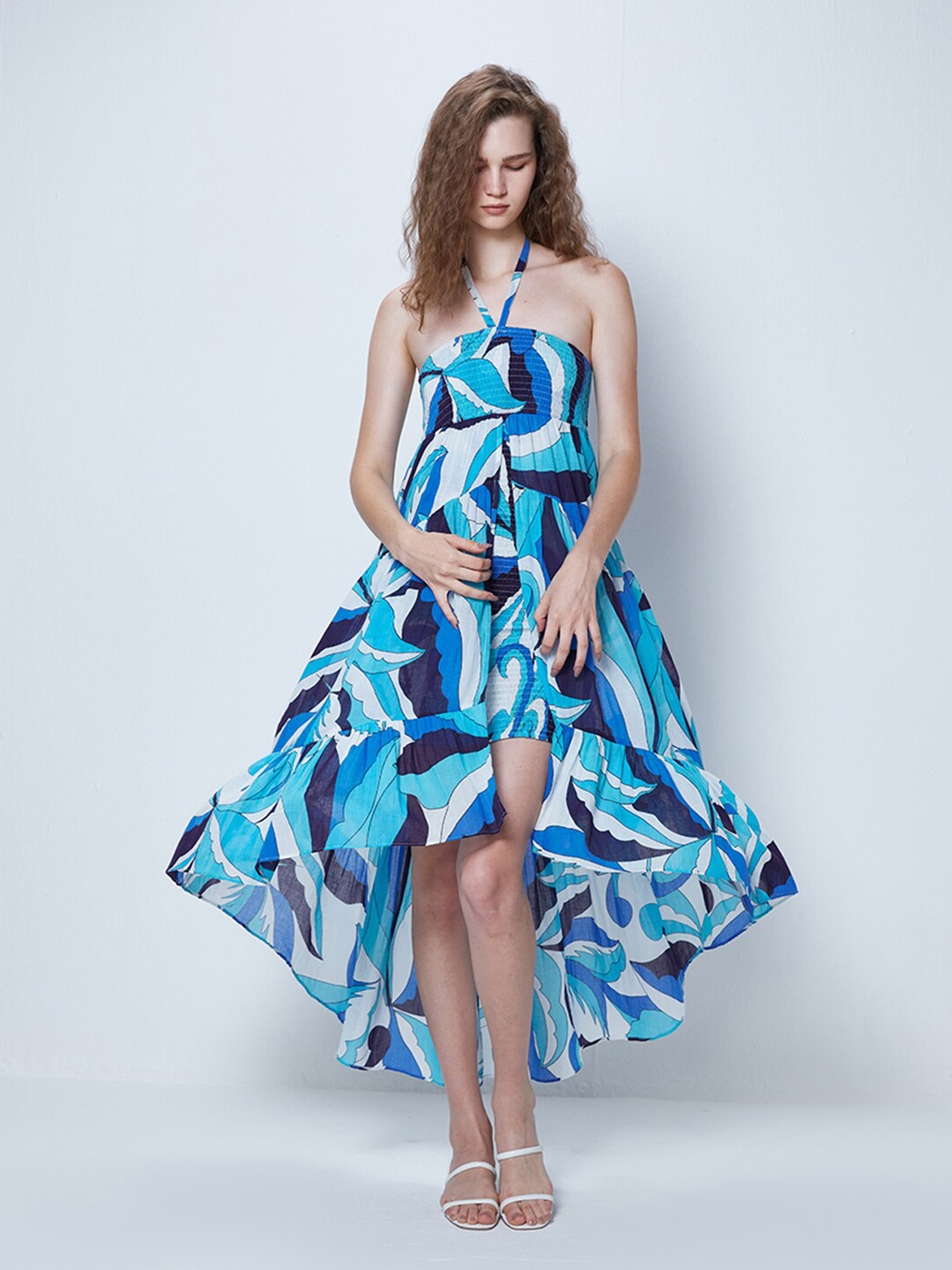 

COVER STORY Blue & White Abstract Printed Smocked Detailed Tie-Up Neck Maxi Dress