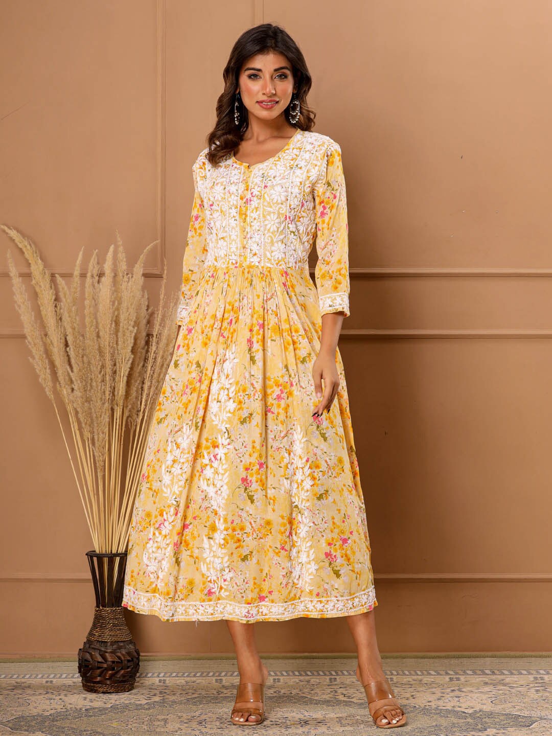 

Meena Bazaar Yellow Floral Printed Embroidered Cotton Fit & Flare Midi Dress
