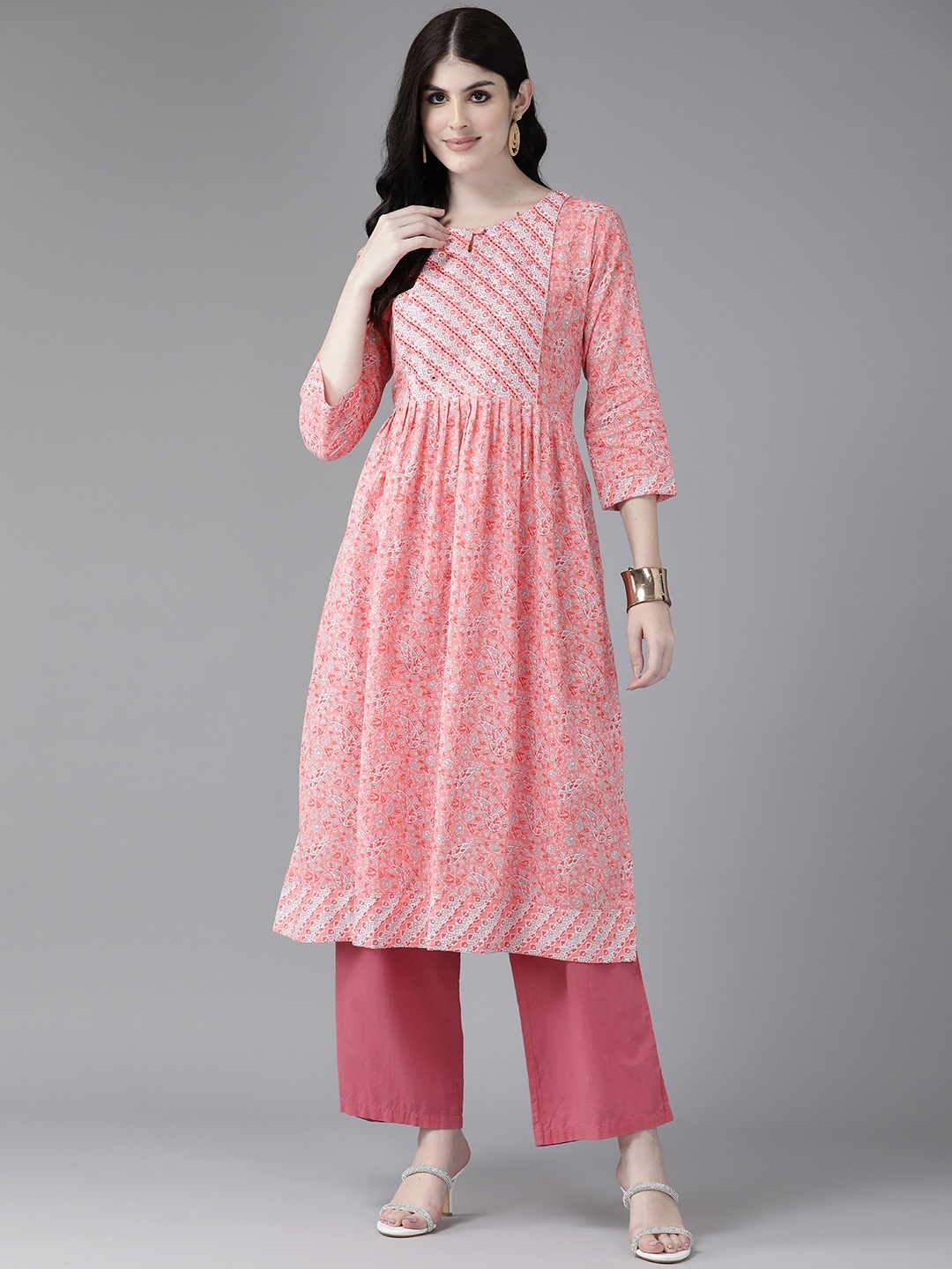 

Aarika Women Peach-Coloured & Red Floral Printed Keyhole Neck Sequinned Floral Kurta